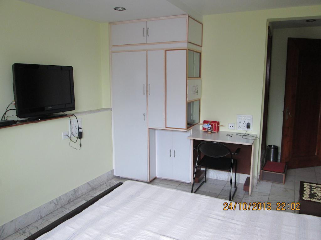 Service Apartments, Park Street, Calcutta Номер фото